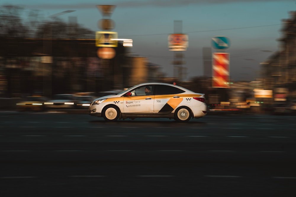A modern taxi car in a city